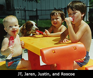 Dr Joe Rodier with children and dog Roscoe
